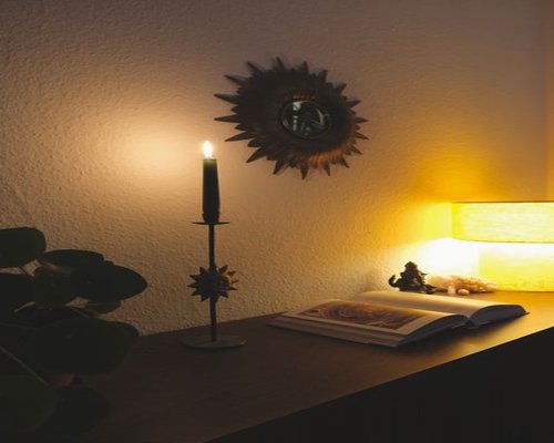 Cozy reading corner with warm indirect lighting
